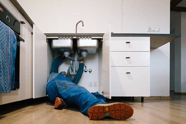 Professional Emergency Plumber technician working in Terryville, CT